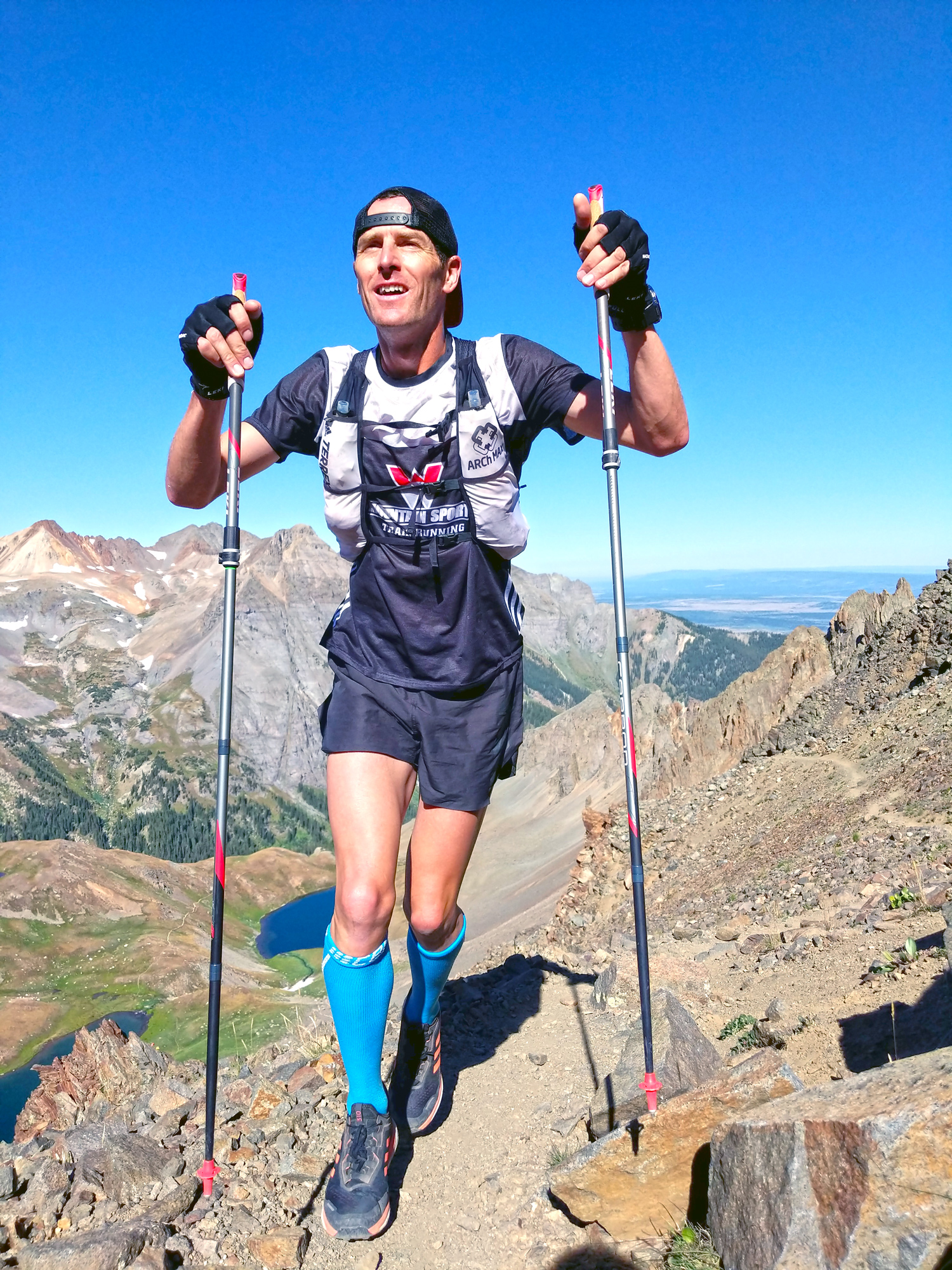 Josh Eberly running to the top of Mt Sneffles